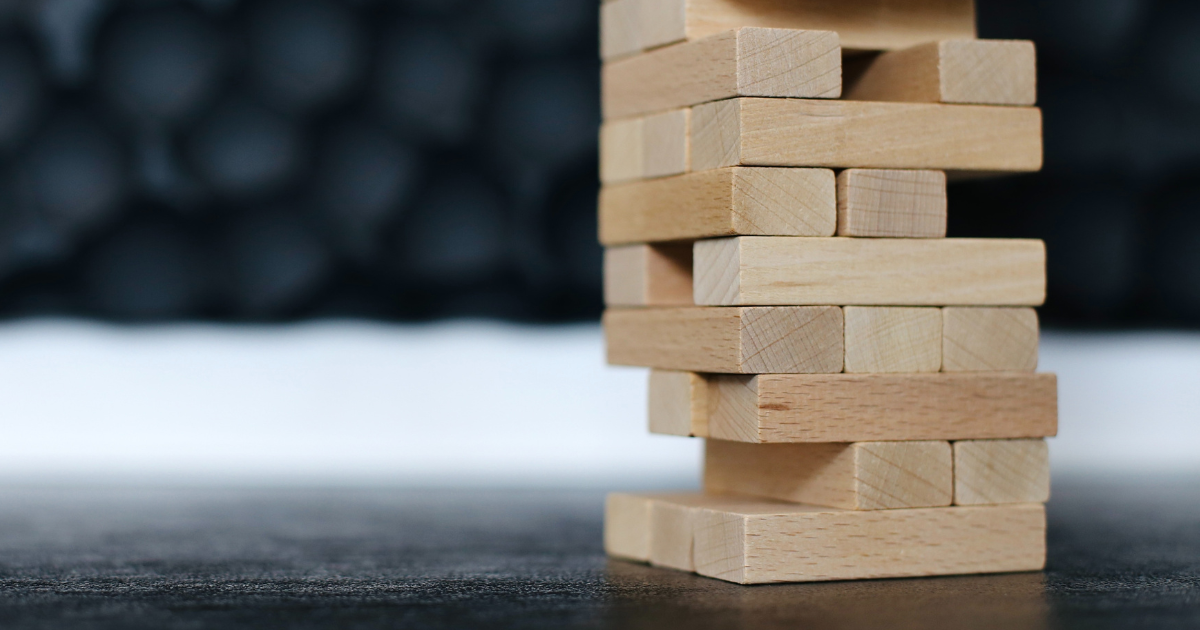 Photo of wooden building blocks with missing pieces